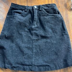 Brandy Melville black cord or a mini skirts with pockets and back